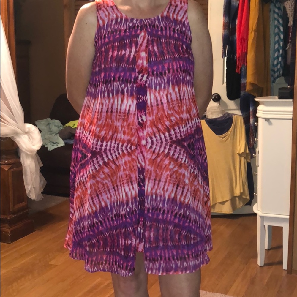 Dress with attached overlay